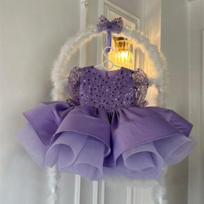 Elegant kid's gown for a Princess A dreamy, purple princess gown with a sparkling tiara, perfect for a fairytale ball A magical, midnight gown in different with twinkling stars and a flowing cape. we can deliver any of the colors to you. Shipping is included in the Price