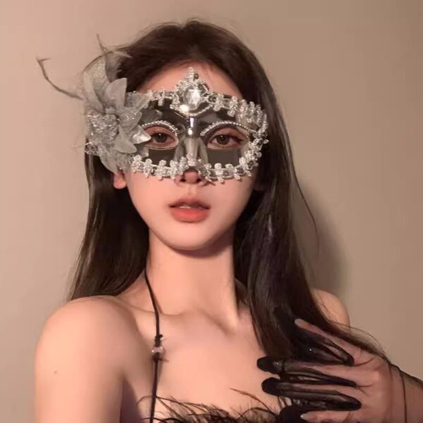 Elegant Lace Masquerade Mask with Feather Accent