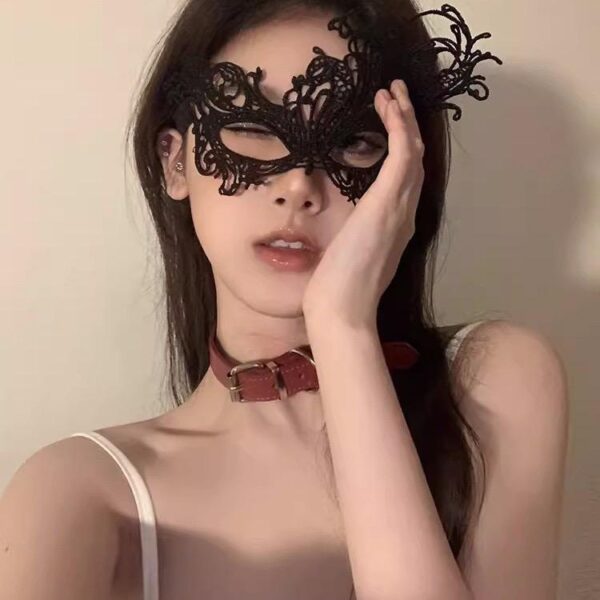 Elegant Black Lace Masquerade Mask with Feather Accent