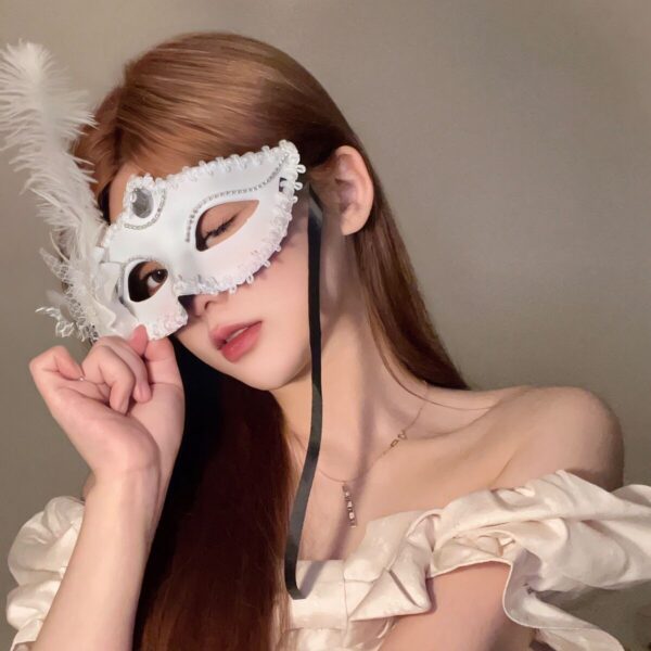 Elegant Lace Masquerade Mask with Feather Accent